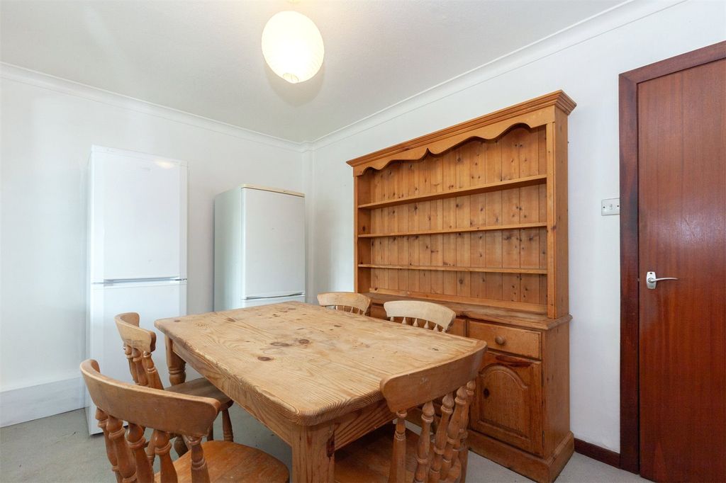 Property photo 3 of 12 Dining Room