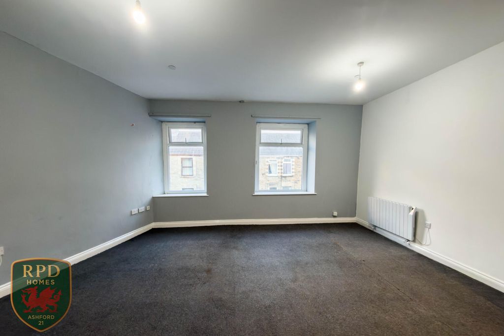 Property photo 3 of 8 Living Room