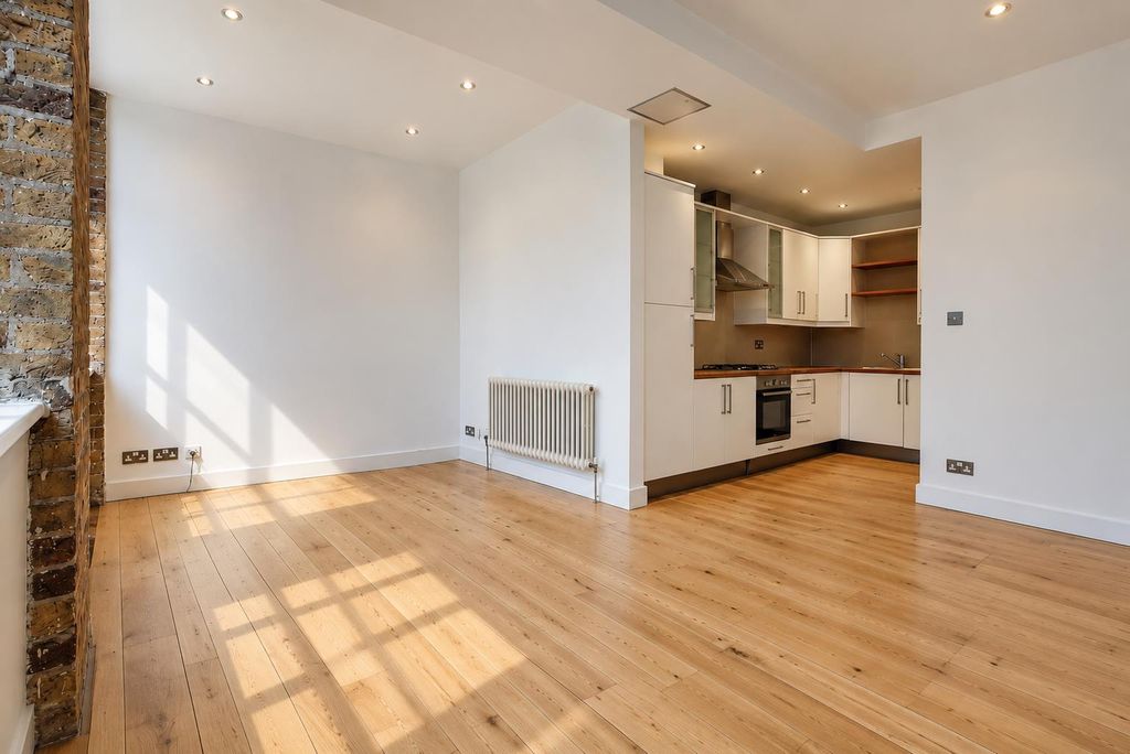 Property photo 3 of 7 Sunlit Industrial Open-Plan Apartment.Png
