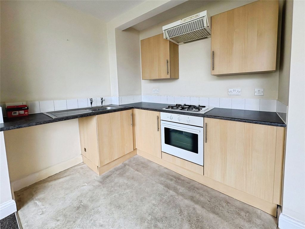 Property photo 3 of 8 Kitchen