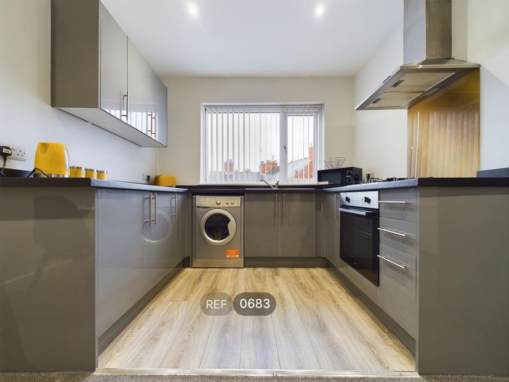 Property photo 1 of 8 Kitchen/Living Area