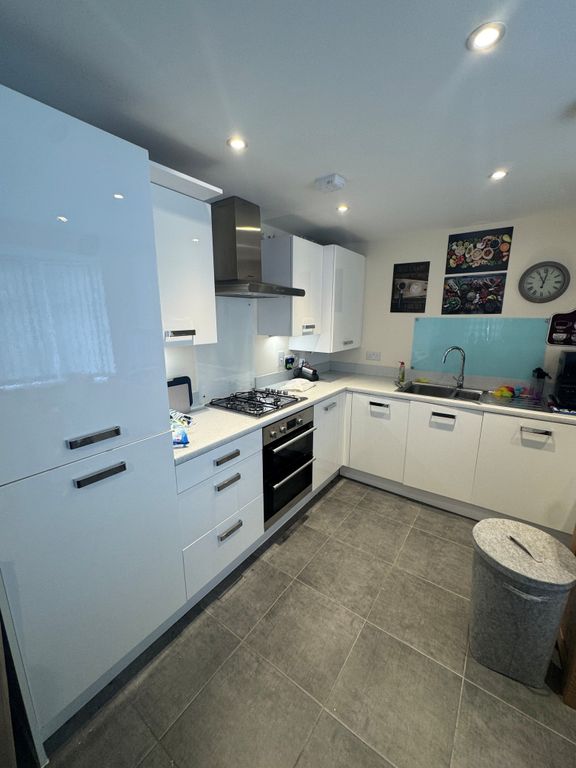 Property photo 3 of 12 Kitchen