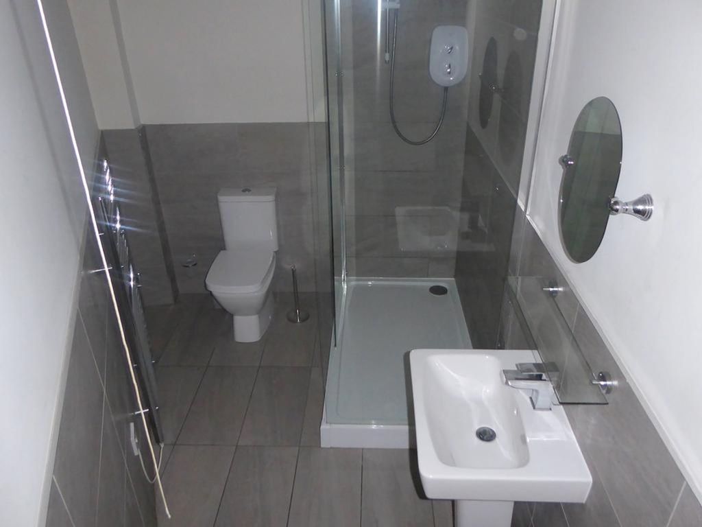 Property photo 1 of 6 A Modern And Clean Bathroom Featuring A Shower, To...