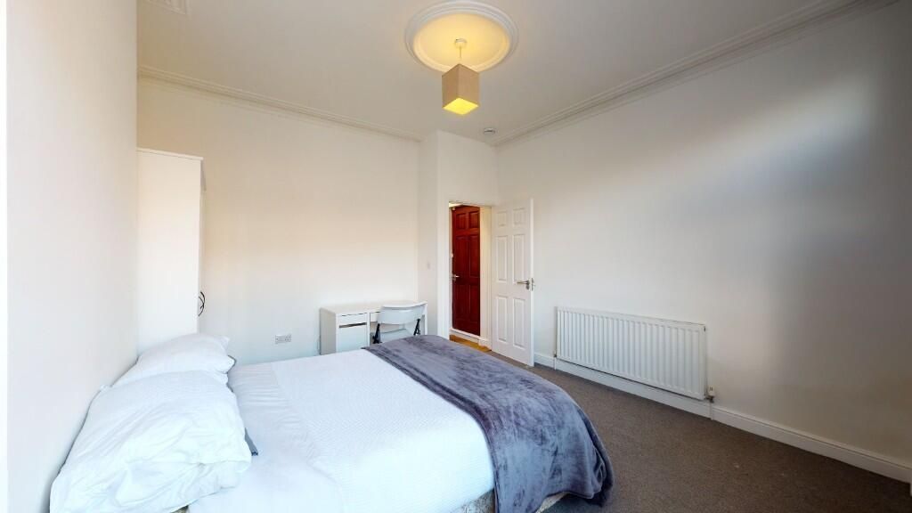 Property photo 2 of 11 A Bright And Tidy Master Bedroom Featuring A Comfo...