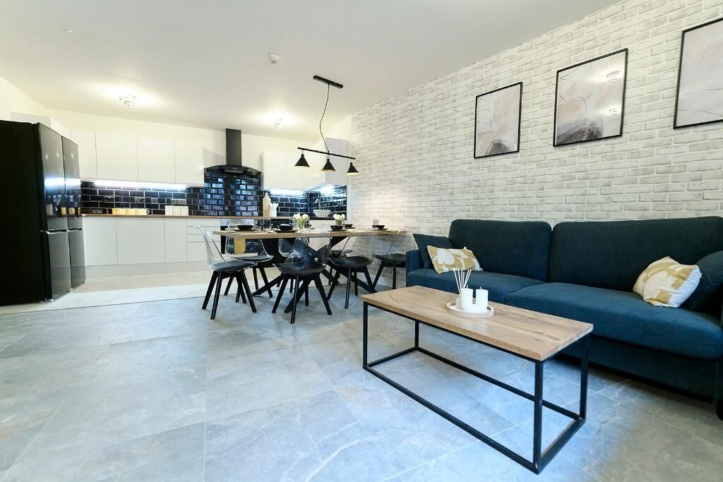 Property photo 1 of 14 A Stylish, Modern Open-Plan Living Room And Kitche...