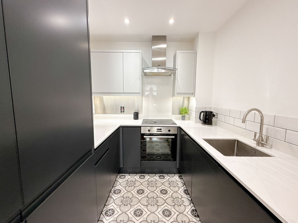 Property photo 2 of 12 Kitchen