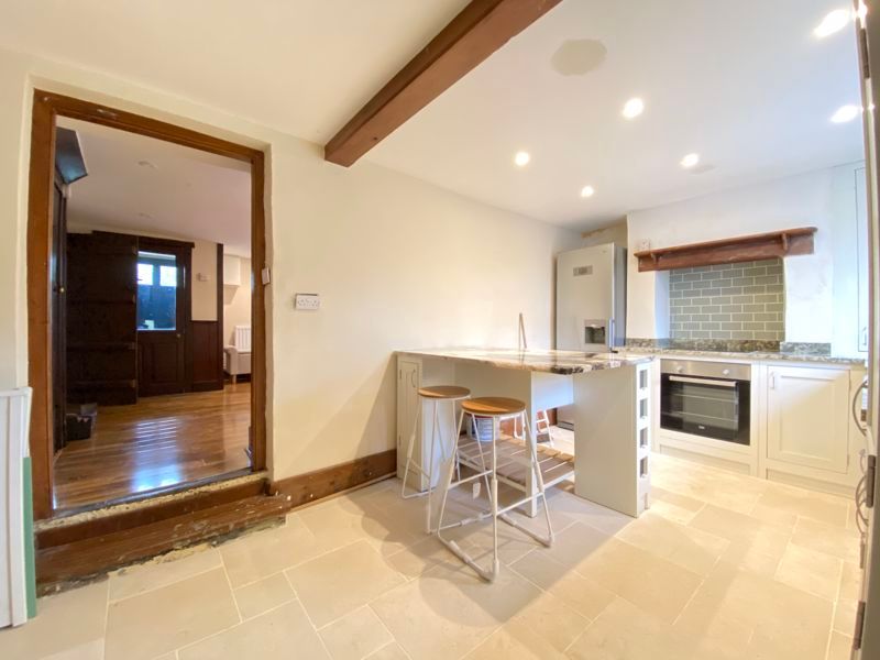 Property photo 3 of 13 Dining Kitchen