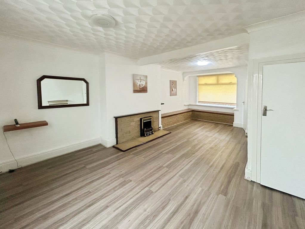 Property photo 2 of 12 Living