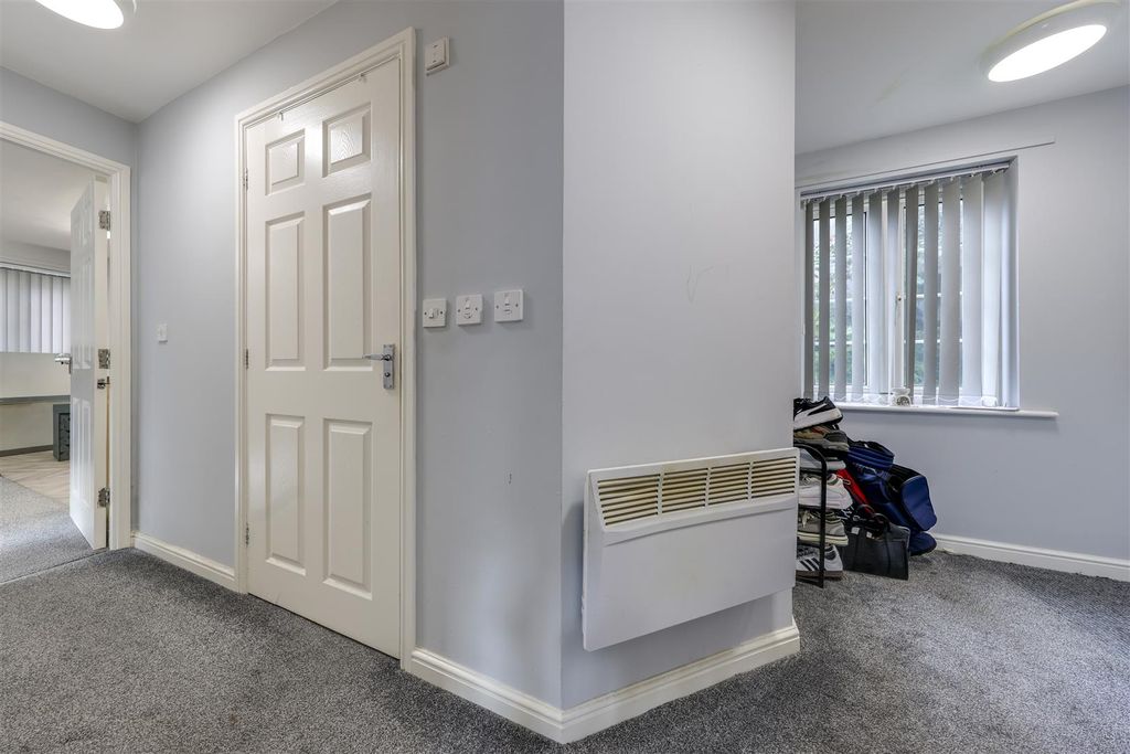 Property photo 3 of 12 Hallway With Storage
