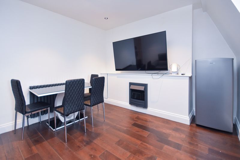 Property photo 2 of 12 Living Room