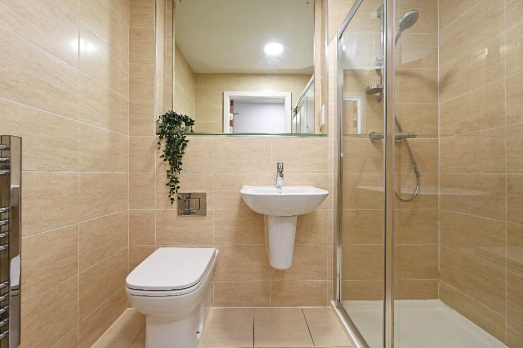 Property photo 3 of 12 A Modern And Well-Maintained Bathroom Suite With B...