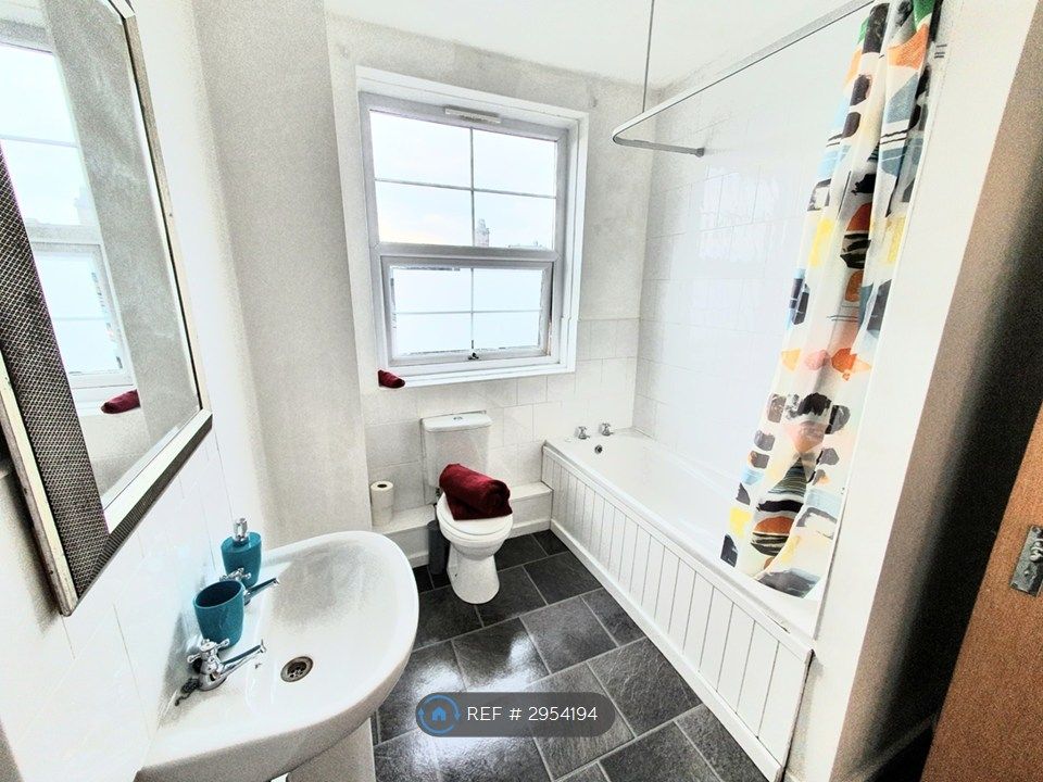 Property photo 2 of 9 Modern Bathroom
