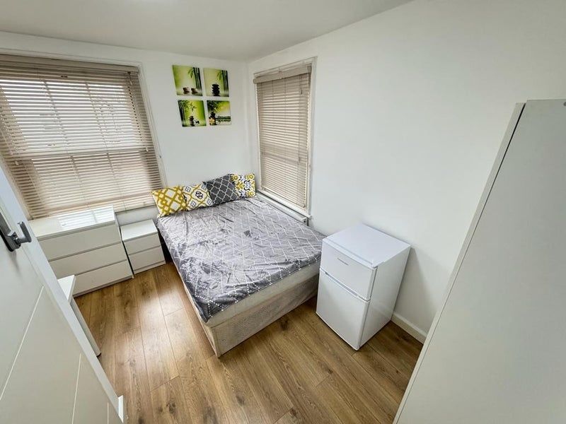 Property photo 3 of 5 Bright Double Bedroom Featuring Large Windows With...