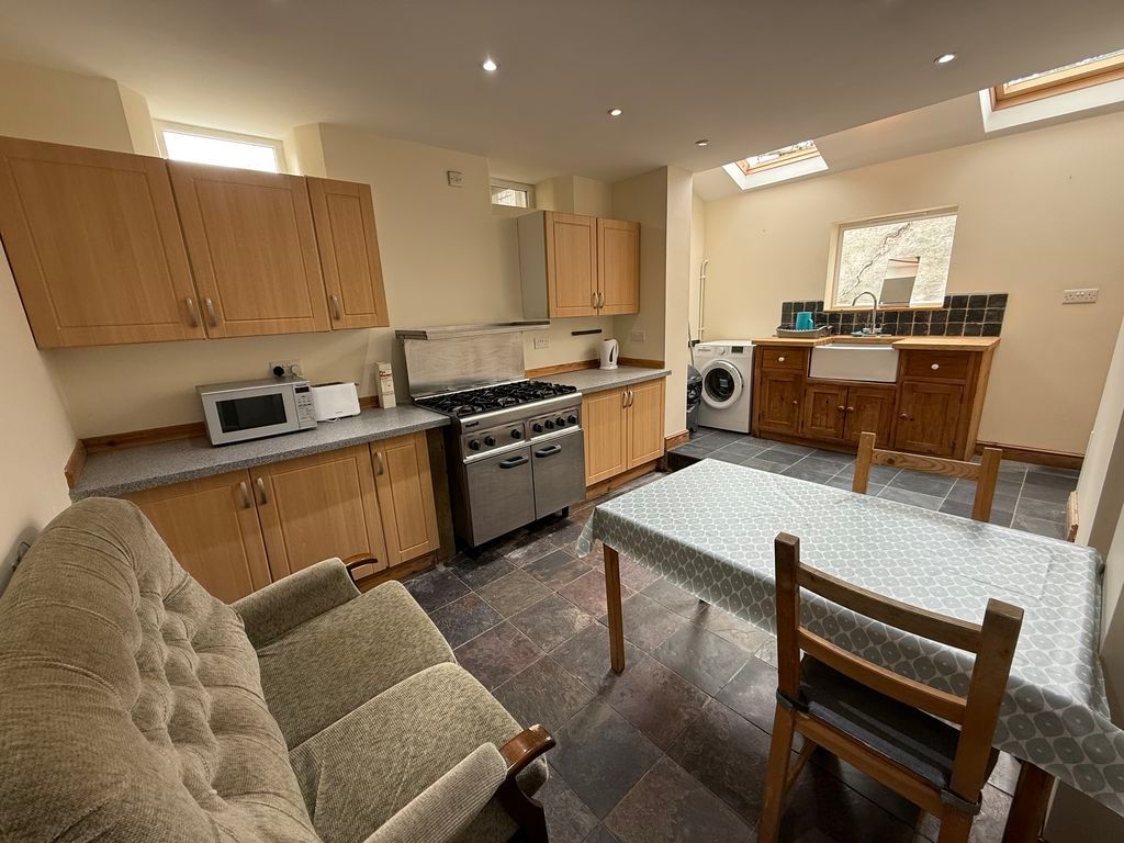 Property photo 1 of 8 Kitchen/Living Room