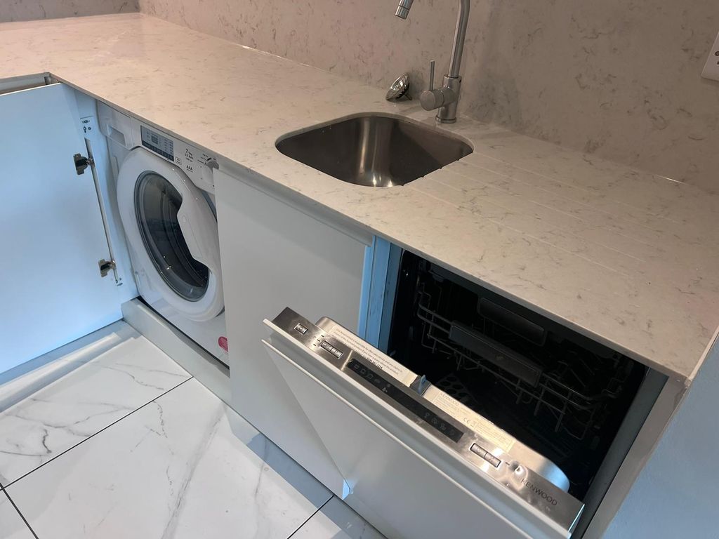 Property photo 3 of 10 Kitchen