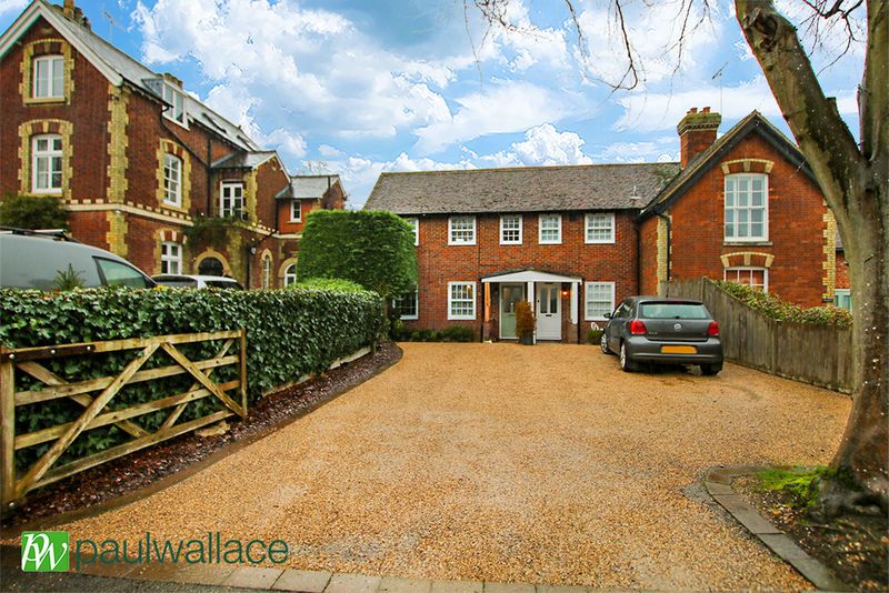 Property photo 1 of 11 Front Exterior With Gated Driveway