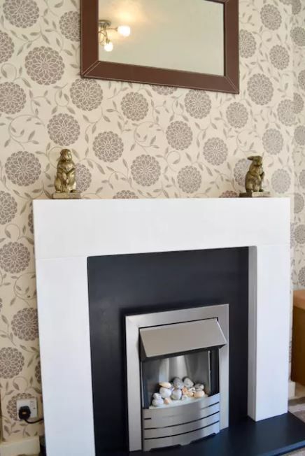 Property photo 3 of 11 Fireplace