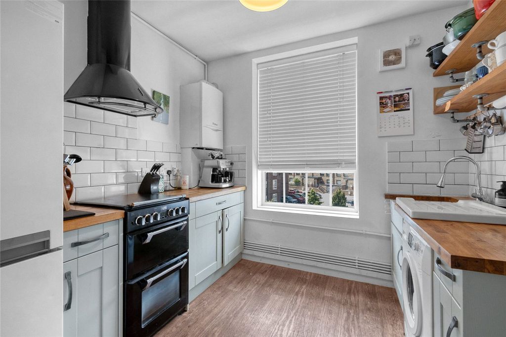 Property photo 3 of 8 Kitchen
