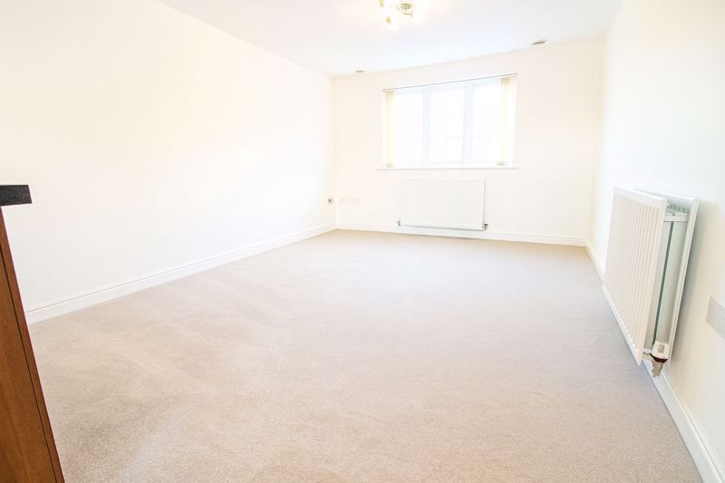 Property photo 3 of 12 Living Room Area