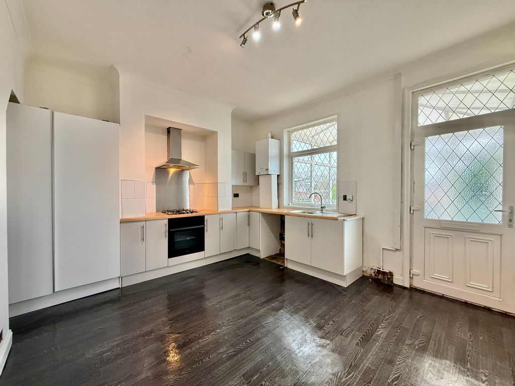 Property photo 3 of 12 Dining Kitchen