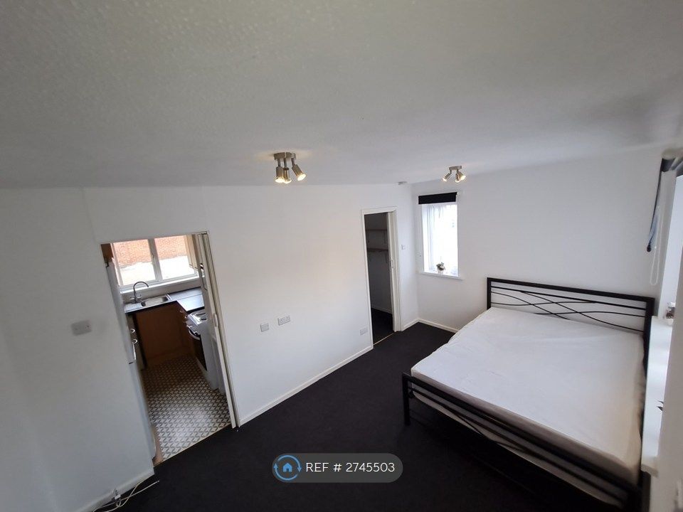 Property photo 2 of 7 Bedroom/Kitchen