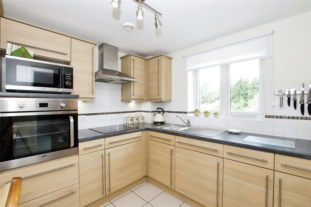 Property photo 3 of 12 Kitchen