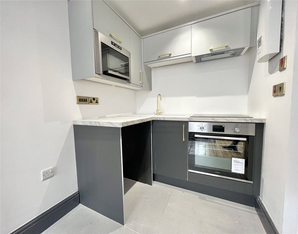 Property photo 3 of 7 Kitchen