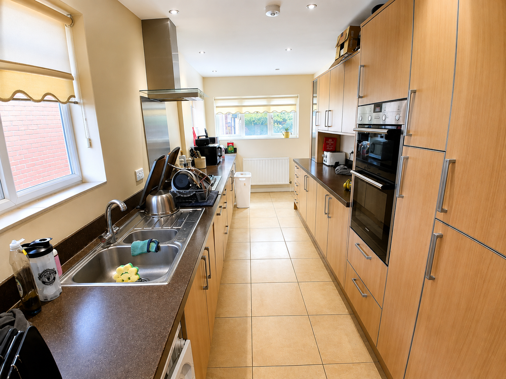 Property photo 3 of 12 Kitchen