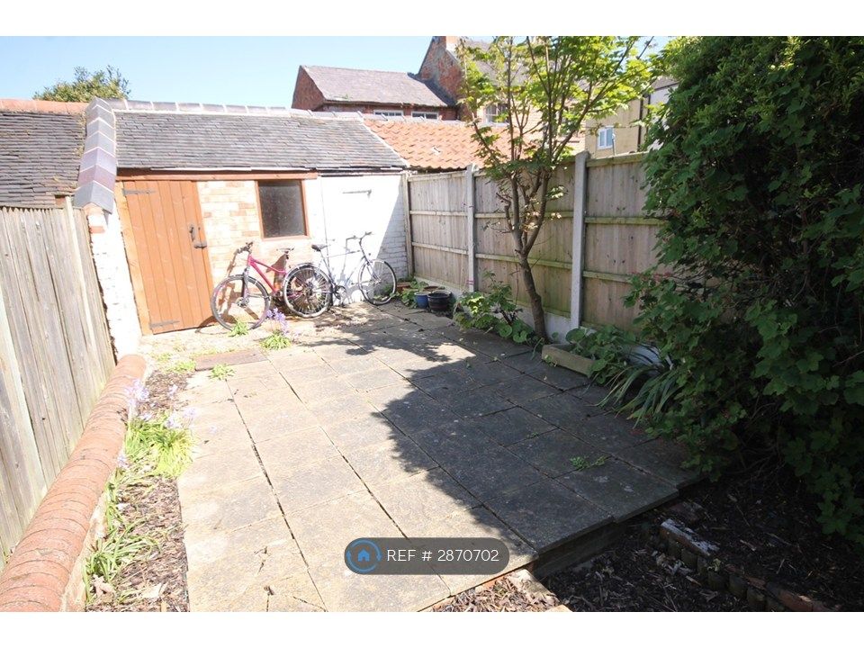 Property photo 2 of 7 Rear Garden With Storage And Coal/Recycling Sheds