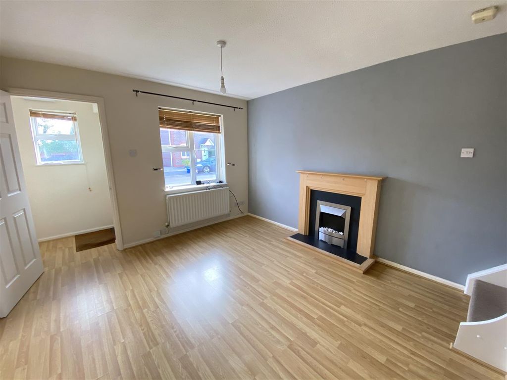Property photo 3 of 12 Living Area