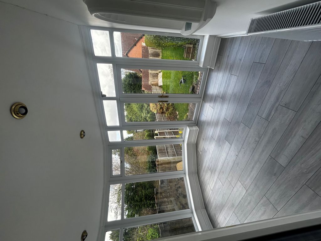 Property photo 2 of 8 Sunroom