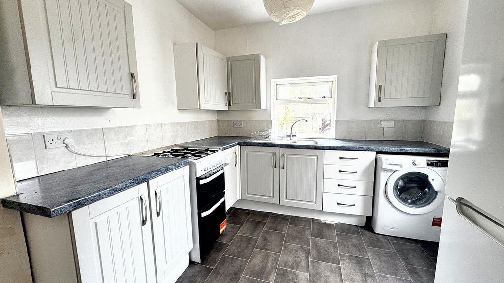 Property photo 3 of 6 Bright White Kitchen With Shaker-Style Cabinets, d...