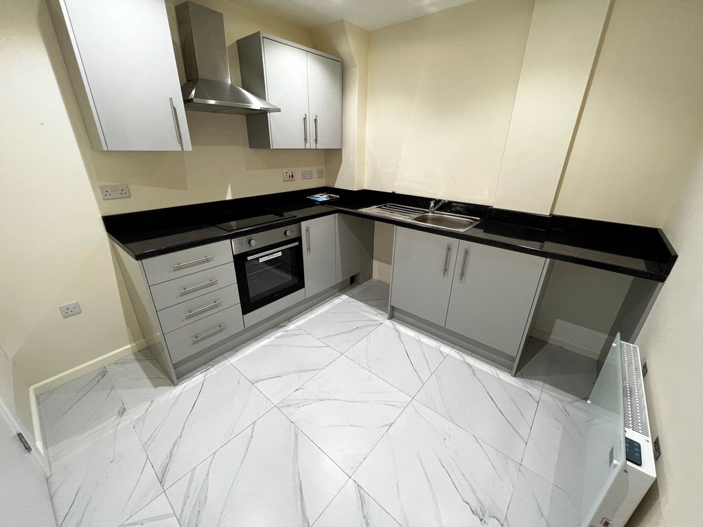 Property photo 3 of 8 Kitchen