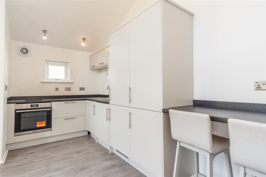 Property photo 3 of 12 Kitchen