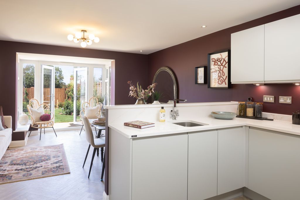 Property photo 1 of 9 Kitchen With Dining Area In The Rockley 3 Bedroom Home