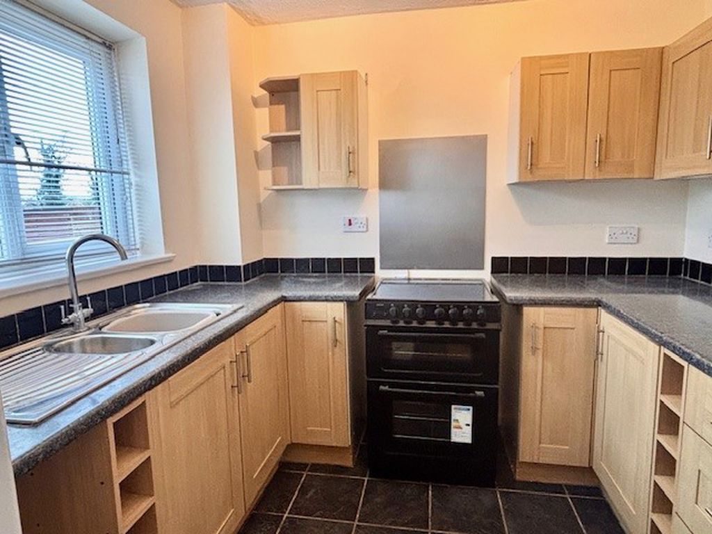 Property photo 2 of 7 Kitchen