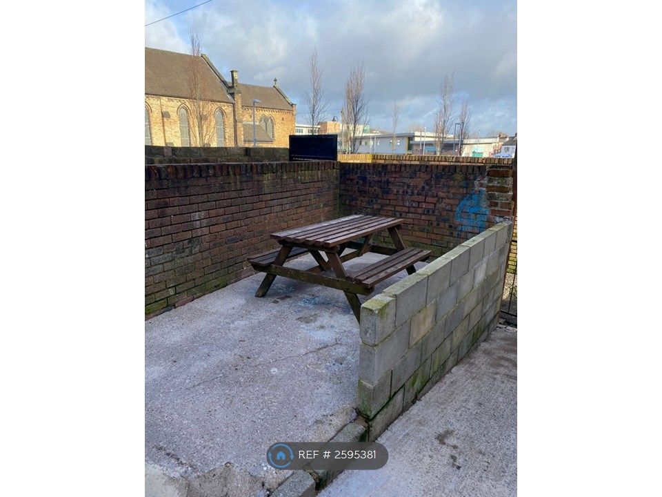 Property photo 3 of 8 Communal Bench In Paved Area