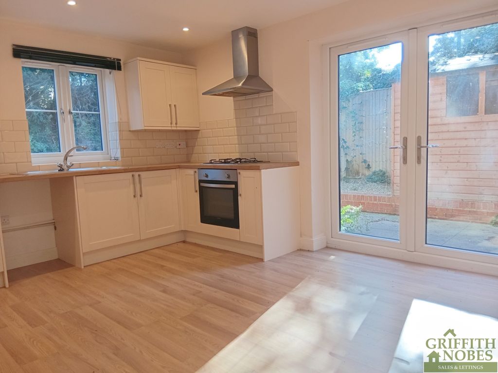 Property photo 3 of 16 Kitchen Area And Patio Doors