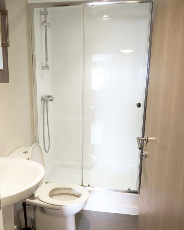 Property photo 1 of 5 A Modern And Clean Bathroom Featuring A Spacious S...