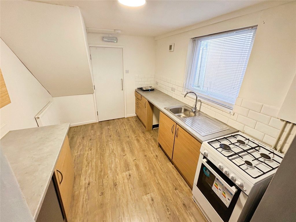 Property photo 3 of 8 Kitchen