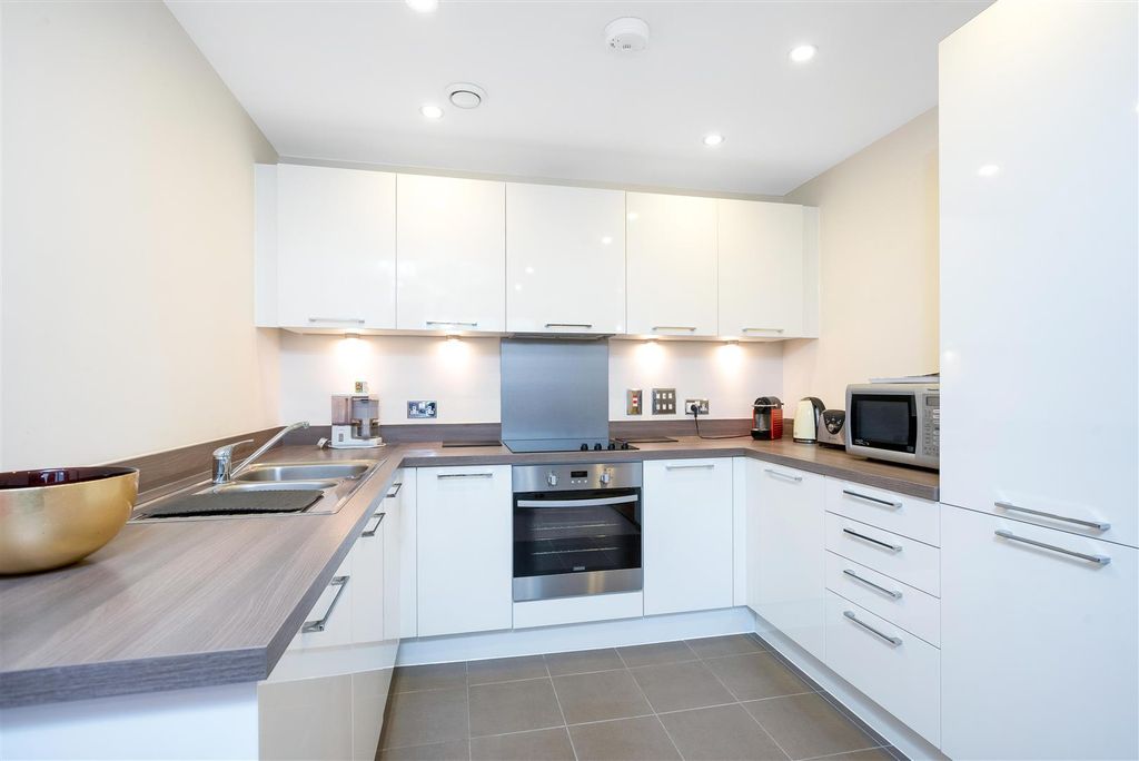 Property photo 3 of 9 Kitchen Area