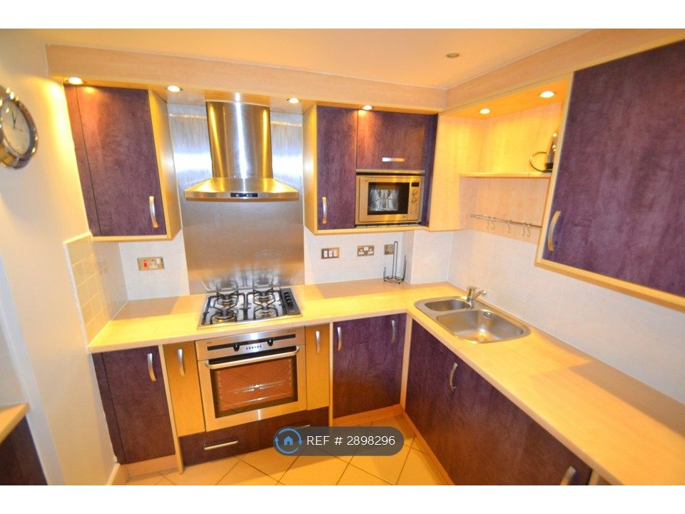 Property photo 3 of 12 Kitchen