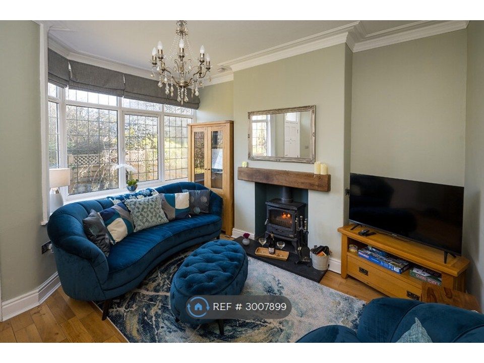 Property photo 1 of 10 Cosy Living Room With A Wood Burning Stove.