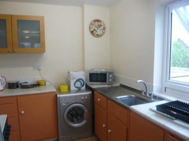 Property photo 3 of 8 Kitchen