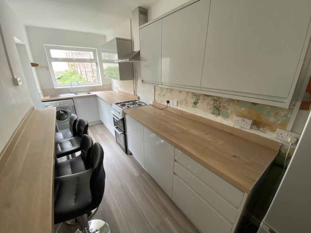 Property photo 2 of 10 A Modern Kitchen With Ample Counter Space And Natu...