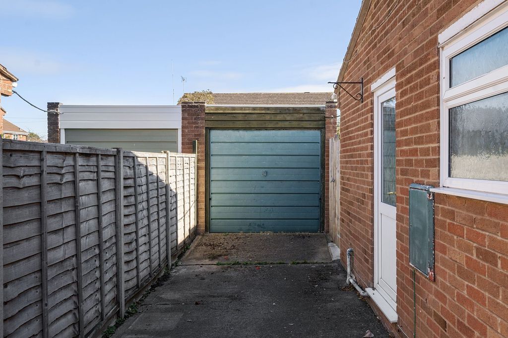 Property photo 2 of 13 Driveway And Garage