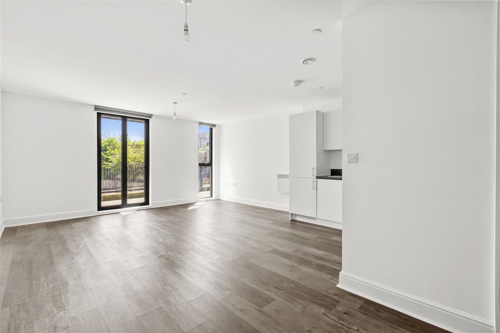 Property photo 2 of 8 Living