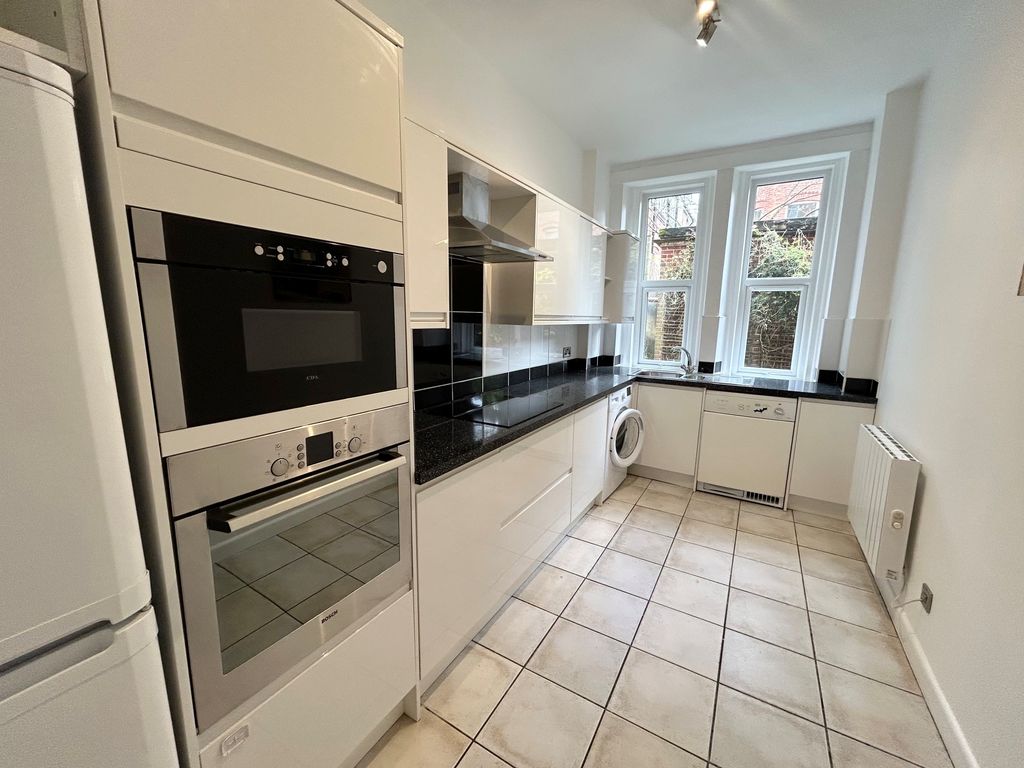Property photo 3 of 13 Kitchen