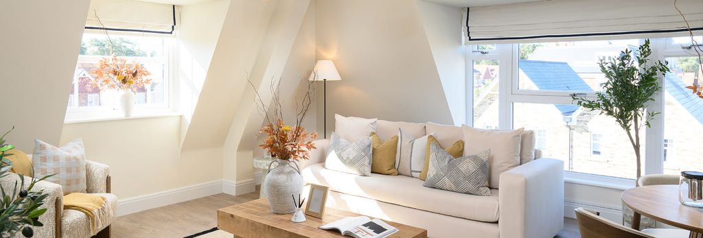 Property photo 2 of 5 Living Space In Attic Loft Space, Decorated In Neutral Tones, Modern Design.