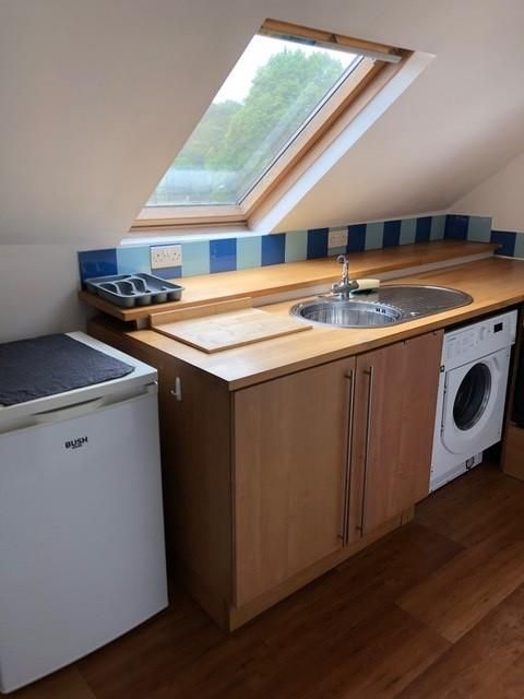 Property photo 3 of 8 Kitchen